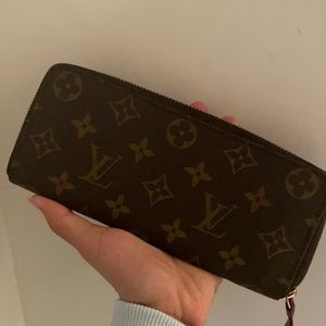 Brown Louis Vuitton wallet with pink inside